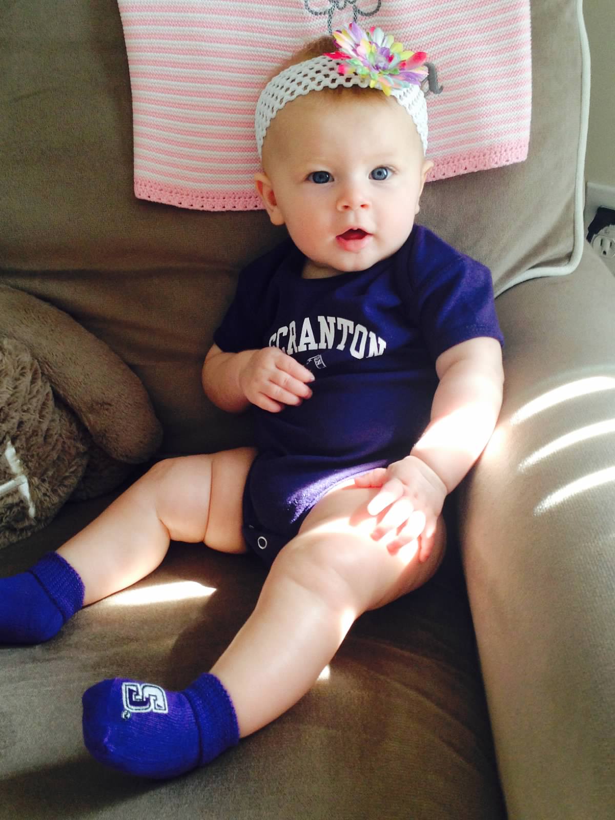 Anna Haggerty sporting her UofS onesie & socks :)