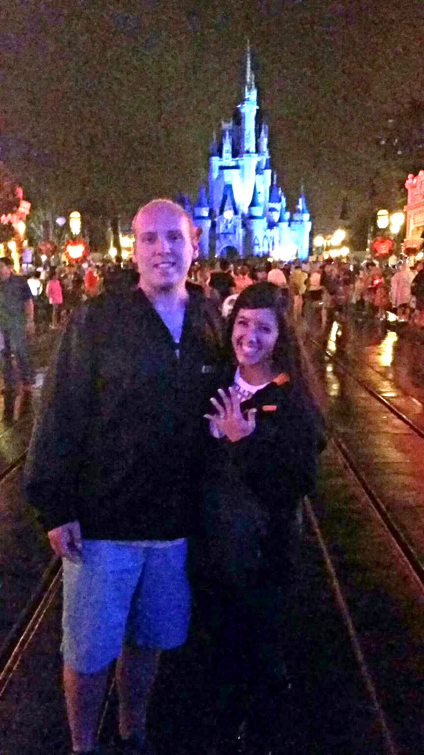 Celebrating their engagement in Disney World! 