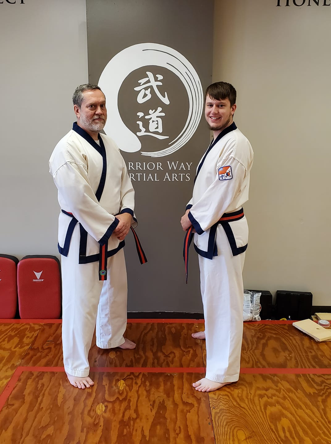 James and Adam Kunz receive Master's belt